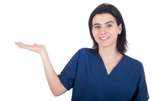 smiling young female doctor showing copy space (isolated on white background)