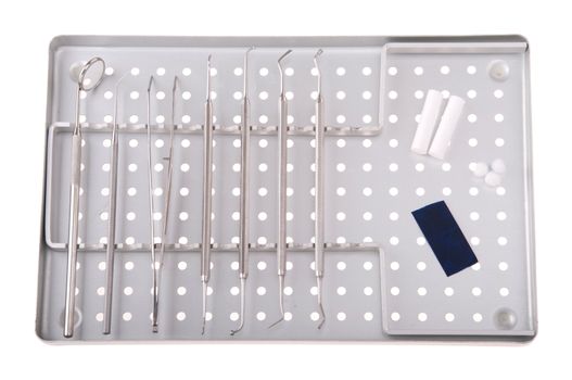 dentistry kit in a metal tray (surgery instruments, articulation paper, cotton rolls and wools)