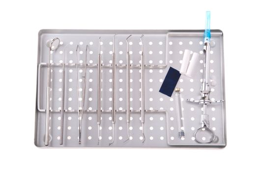 dentistry kit in a metal tray (surgery instruments, articulation paper, cotton rolls/wools, cartridge and syringe)