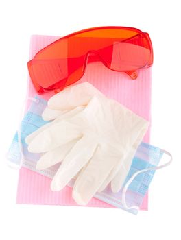 health and safety equipment (glasses, gloves, mask and bib) to prevent cross infection (isolated on white)