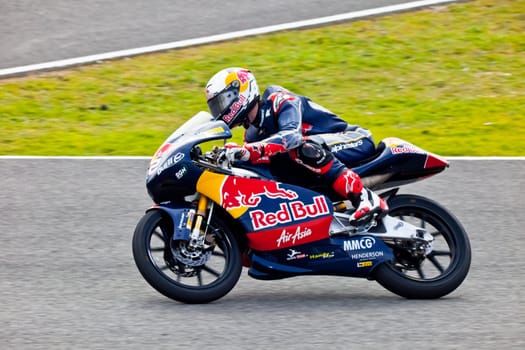 JEREZ DE LA FRONTERA, SPAIN - MAR 5:125cc pilot Danny Kent races on the official training of the world championship of MotoGP on Mar 5, 2011, in Jerez de la Frontera, Spain