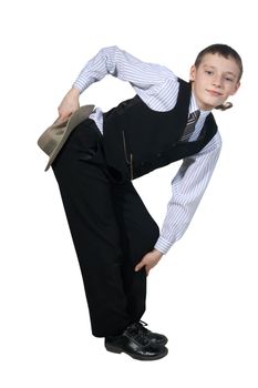 Boy in a grey hat and in a black suit on the white background
