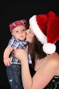 Beautiful caucasian mother and son celebrating christmas