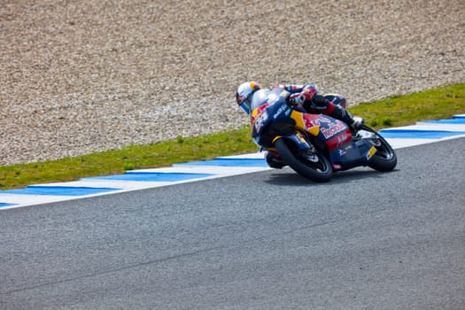 JEREZ DE LA FRONTERA, SPAIN - MAR 5:125cc pilot Jonas Folger takes a curve on the official training of the world championship of MotoGP on Mar 5, 2011, in Jerez de la Frontera, Spain
