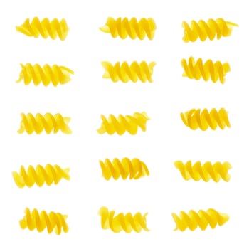 Set of fusilli pasta isolated on white background.