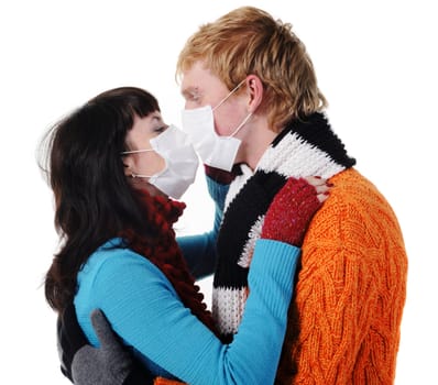 man embraces a woman wearing masks, flu, A(H1N1)