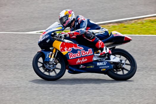 JEREZ DE LA FRONTERA, SPAIN - MAR 5:125cc pilot Danny Kent races on the official training of the world championship of MotoGP on Mar 5, 2011, in Jerez de la Frontera, Spain