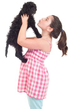 adorable little girl kissing her dog (isolated on white background)