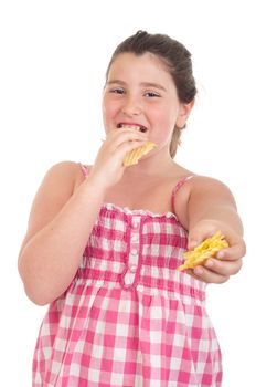 cute little girl eating chips and offering some too (isolated on white background)