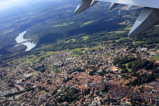 Suburb of Milan through a window of the plane
