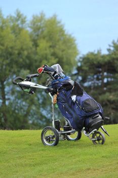 golf caddie and grass green