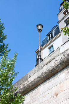 Closeup view of Ile Saint Louis in Paris, with streelight and typical buildings