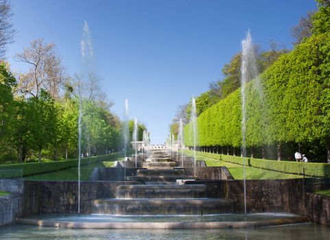 Foutains with water gushing in a nice park in France