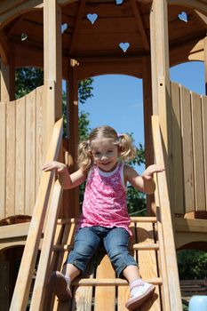 happy little girl on playground