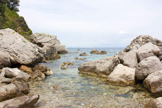 Coast of Capri Island, view of sea and sea-cliff