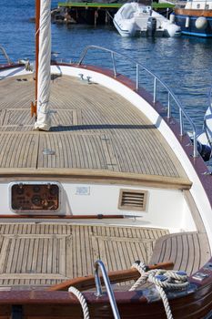 Close-up view of a nice sailboat in the port of Capri