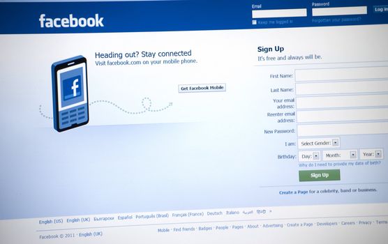 Facebook Logo and sign up page on a laptop screen