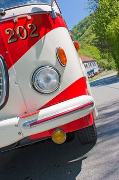 Old bus white and red on the road