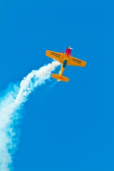 CADIZ, SPAIN-SEP 11: Aircraft Extra 300S of Melissa Pemberton taking part in an exhibition on the 4th airshow of Cadiz on Sep 11, 2011, in Cadiz, Spain