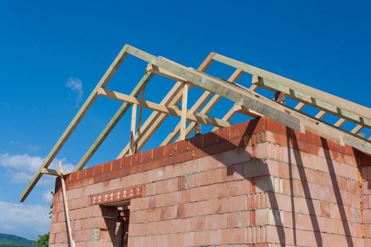 Roof and walls structure of house in construction