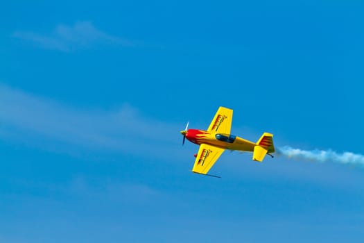 CADIZ, SPAIN-SEP 11: Aircraft Extra 300S of Melissa Pemberton taking part in an exhibition on the 4th airshow of Cadiz on Sep 11, 2011, in Cadiz, Spain