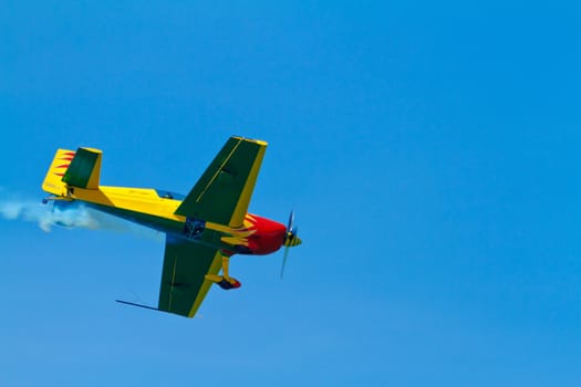 CADIZ, SPAIN-SEP 11: Aircraft Extra 300S of Melissa Pemberton taking part in an exhibition on the 4th airshow of Cadiz on Sep 11, 2011, in Cadiz, Spain