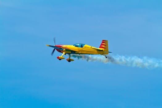 CADIZ, SPAIN-SEP 11: Aircraft Extra 300S of Melissa Pemberton taking part in an exhibition on the 4th airshow of Cadiz on Sep 11, 2011, in Cadiz, Spain