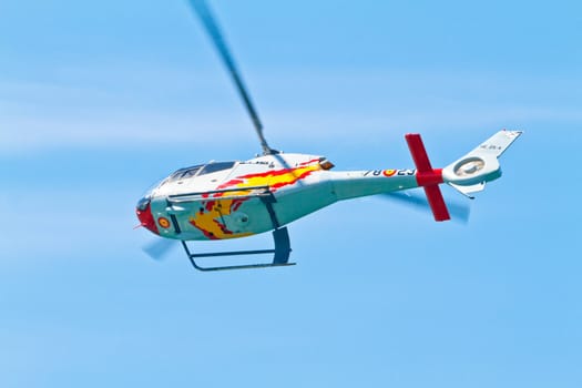 CADIZ, SPAIN-SEP 11: Helicopters of the Patrulla Aspa taking part in an exhibition on the 4th airshow of Cadiz on Sep 11, 2011, in Cadiz, Spain
