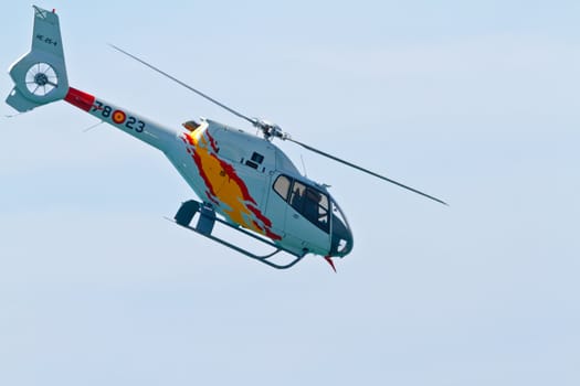 CADIZ, SPAIN-SEP 11: Helicopters of the Patrulla Aspa taking part in an exhibition on the 4th airshow of Cadiz on Sep 11, 2011, in Cadiz, Spain
