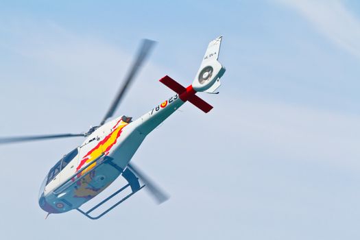 CADIZ, SPAIN-SEP 11: Helicopters of the Patrulla Aspa taking part in an exhibition on the 4th airshow of Cadiz on Sep 11, 2011, in Cadiz, Spain