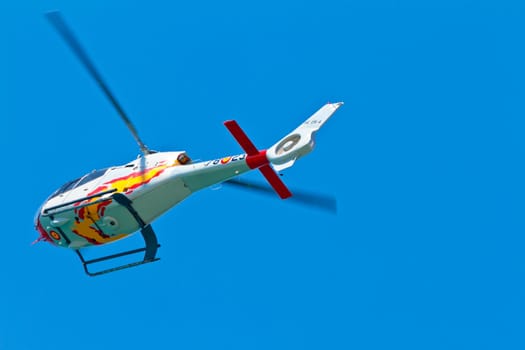 CADIZ, SPAIN-SEP 11: Helicopters of the Patrulla Aspa taking part in an exhibition on the 4th airshow of Cadiz on Sep 11, 2011, in Cadiz, Spain