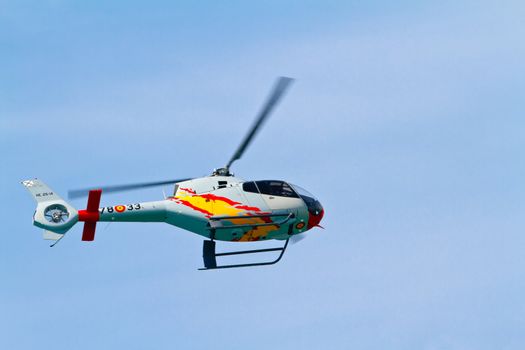 CADIZ, SPAIN-SEP 11: Helicopters of the Patrulla Aspa taking part in an exhibition on the 4th airshow of Cadiz on Sep 11, 2011, in Cadiz, Spain