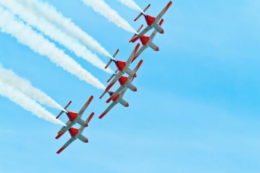 CADIZ, SPAIN-SEP 11: Aircrafts of the Patrulla Aguila taking part in an exhibition on the 4th airshow of Cadiz on Sep 11, 2011, in Cadiz, Spain