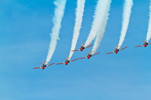 CADIZ, SPAIN-SEP 11: Aircrafts of the Patrulla Aguila taking part in an exhibition on the 4th airshow of Cadiz on Sep 11, 2011, in Cadiz, Spain