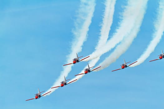 CADIZ, SPAIN-SEP 11: Aircrafts of the Patrulla Aguila taking part in an exhibition on the 4th airshow of Cadiz on Sep 11, 2011, in Cadiz, Spain