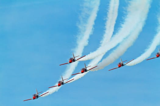 CADIZ, SPAIN-SEP 11: Aircrafts of the Patrulla Aguila taking part in an exhibition on the 4th airshow of Cadiz on Sep 11, 2011, in Cadiz, Spain