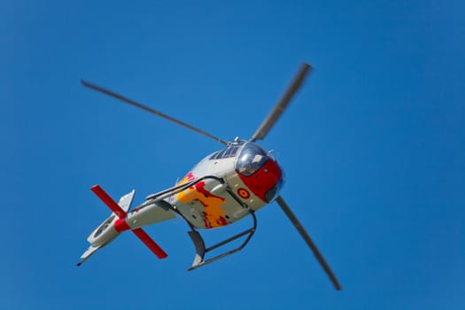 CADIZ, SPAIN-SEP 10: Helicopters of the Patrulla Aspa taking part in an test on the 3rd airshow of Cadiz on Sep 10, 2010, in Cadiz, Spain