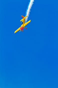 CADIZ, SPAIN-SEP 11: Aircraft Extra 300S of Melissa Pemberton taking part in an exhibition on the 4th airshow of Cadiz on Sep 11, 2011, in Cadiz, Spain