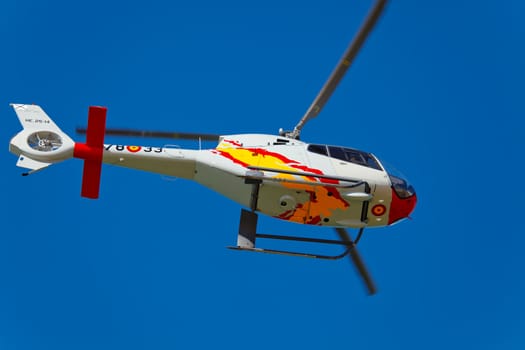CADIZ, SPAIN-SEP 10: Helicopters of the Patrulla Aspa taking part in an test on the 3rd airshow of Cadiz on Sep 10, 2010, in Cadiz, Spain