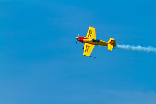 CADIZ, SPAIN-SEP 11: Aircraft Extra 300S of Melissa Pemberton taking part in an exhibition on the 4th airshow of Cadiz on Sep 11, 2011, in Cadiz, Spain