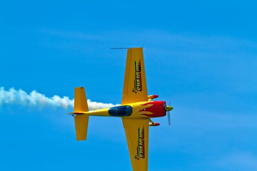 CADIZ, SPAIN-SEP 11: Aircraft Extra 300S of Melissa Pemberton taking part in an exhibition on the 4th airshow of Cadiz on Sep 11, 2011, in Cadiz, Spain