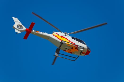 CADIZ, SPAIN-SEP 10: Helicopters of the Patrulla Aspa taking part in an test on the 3rd airshow of Cadiz on Sep 10, 2010, in Cadiz, Spain