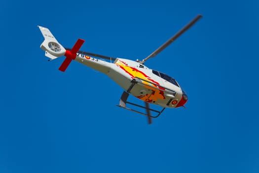 CADIZ, SPAIN-SEP 10: Helicopters of the Patrulla Aspa taking part in an test on the 3rd airshow of Cadiz on Sep 10, 2010, in Cadiz, Spain