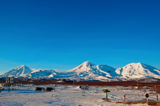 Military training base against a volcano in Russia