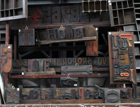 typography vintage wood press in a stall