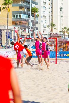 CADIZ, SPAIN - JULY 19: Unidentified players compete in a match between Autoescuela Barquin and CadizSur Seguros BMPY in the 19th league of beach handball of Cadiz on July 19, 2011 in Cadiz, Spain