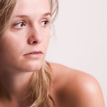 Portrait of a beautiful blond in thoughts