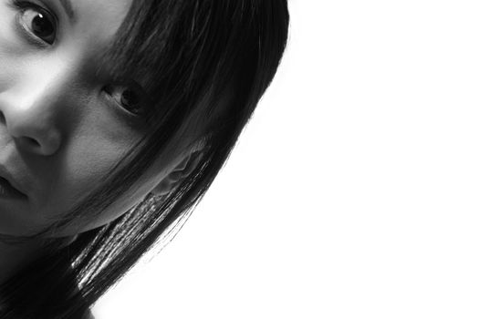 Studio portrait of a asian girl looking curious