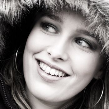 Studio portrait of a beautyful model in a coat