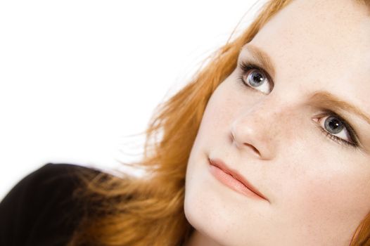 Studio portrait of natural red haired beauty